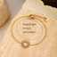 Goldfarbenes Edelstahl-Armband mit Sonnenanhänger für Damen thumbnail 3