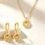 Set Kalung Rantai Manik-Manik Tulang Selangka Liontin Natal Lipit Stainless Steel Berlapis Emas 18K yang Lucu dan Anting-Anting Lingkaran Geometris thumbnail 1