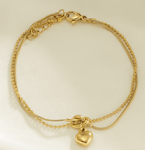 Armband aus goldfarbenem Edelstahl mit doppelter Kette und Herzanhänger