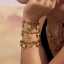 Conjunto de pulsera y cadena con colgante de corazón y lazo de acero inoxidable chapado en oro de 18 quilates de alta calidad. thumbnail 2