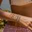 Pulsera de tenis de circonita chapada en oro, apilable, con diseño de luna y estrella, y doble capa. thumbnail 1