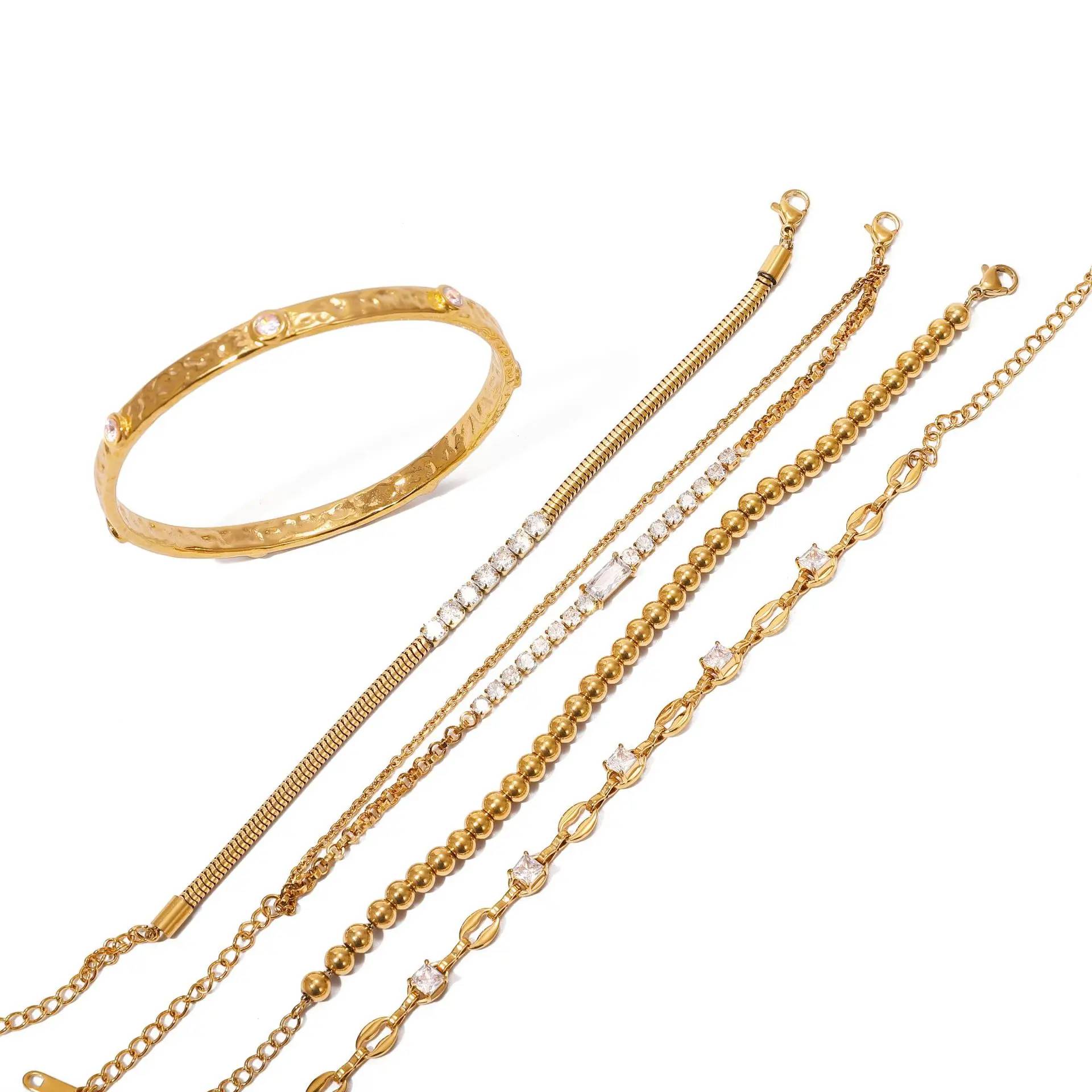 Pulsera de cadena apilable hipoalergénica de acero inoxidable chapado en oro de 18 quilates con circonitas de Lonceen Jewelry